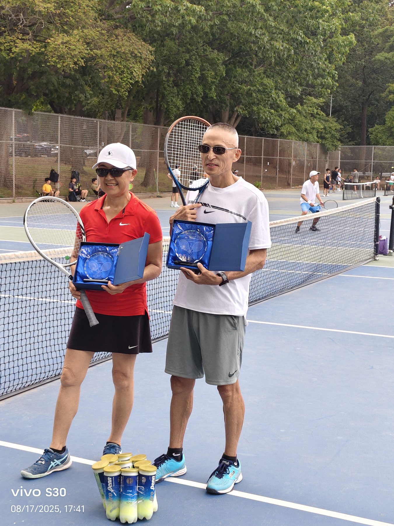 Players holding tournament awards