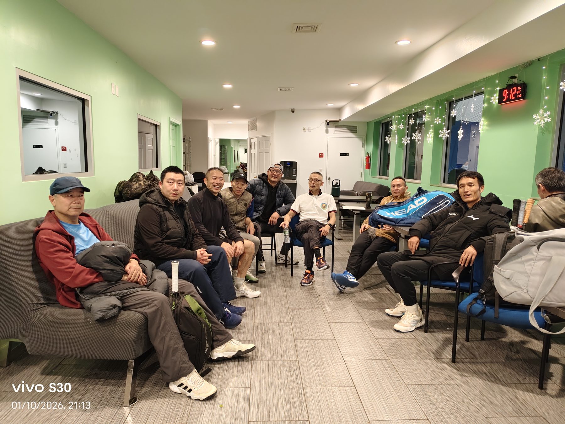 Members relaxing together after tennis